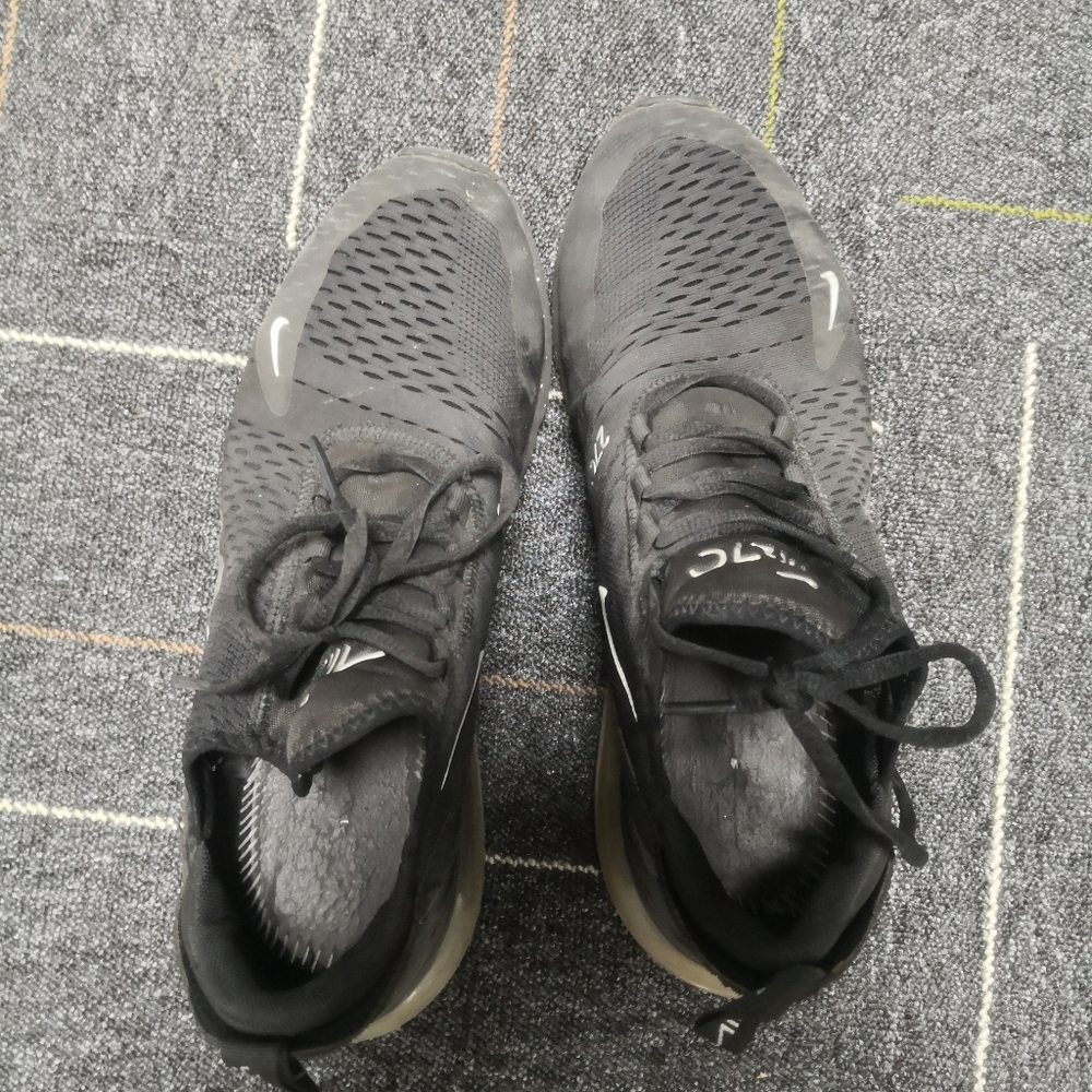 branded men's black running shoes